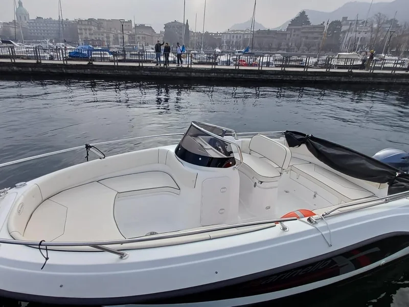 Self-drive fiberglass boat for rental on Lake Como