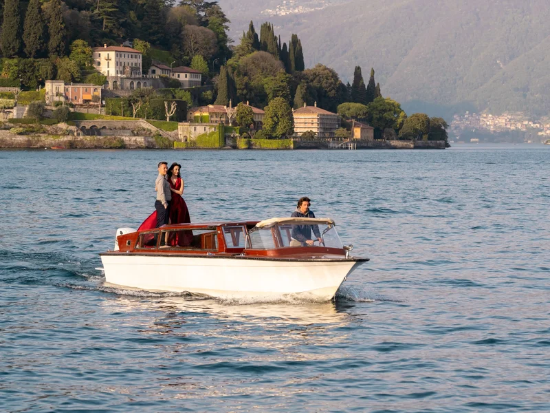 Guests enjoying a luxury private boat experience on Lake Como